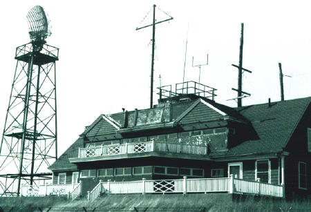 Old pic of Harbor Entrance Command Post, Narraganset Bay, with Radar and radio antennae and base end stations and command posts disguised as a 'cottage'